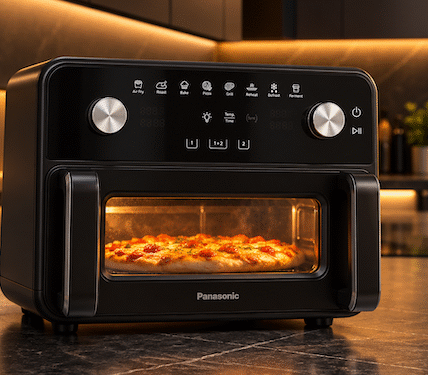 Panasonic Airfryer Test - Die Heissluftfriteuse steht in unserer Küche mit einer Pizza im Garkorb